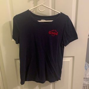 Navy tee with “see the good” writing